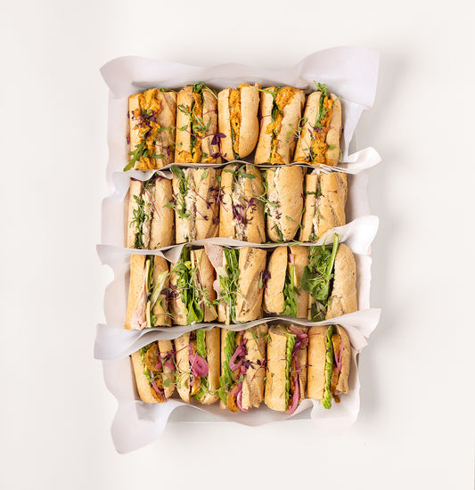 Classic baguette sandwich with ham and cheese, chicken and falafel selection baguettes for catering in Leeds